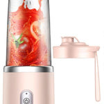Mini smoothie blender crushing ice and frozen fruits